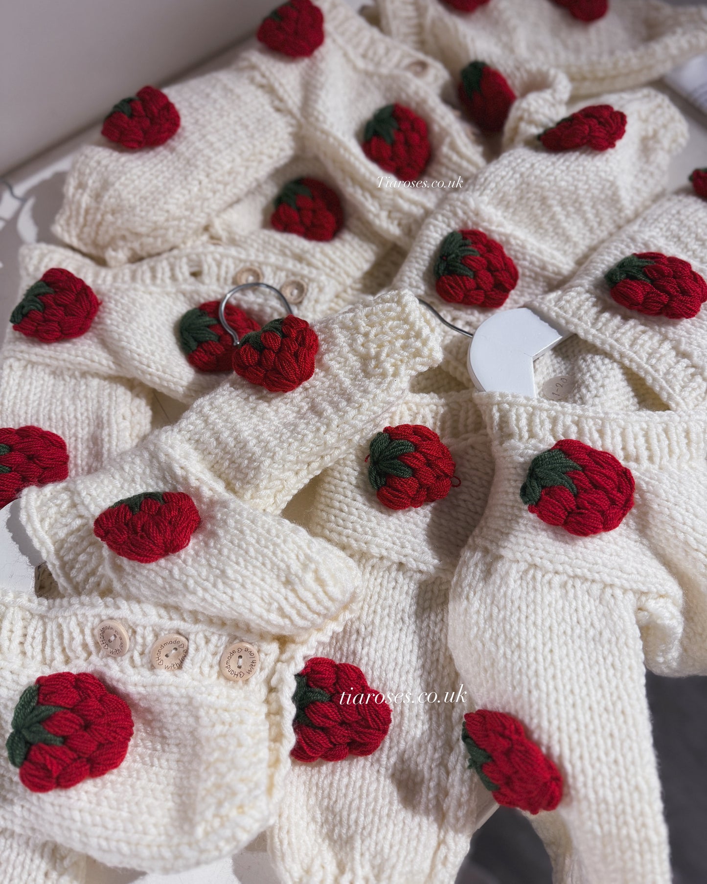 In stock handknitted strawberry cardigan beige