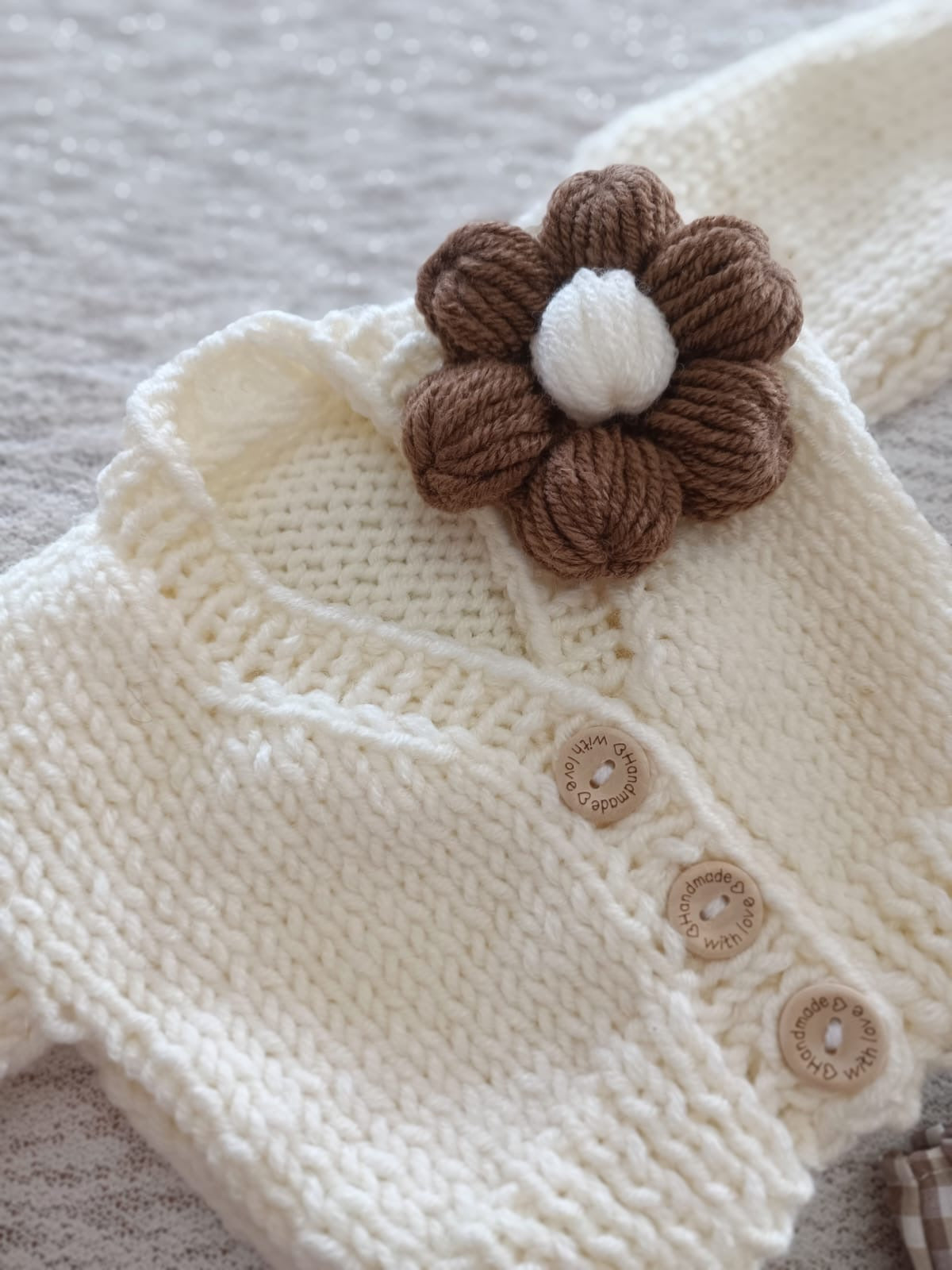 Cream handknitted cardigan with autumn flower
