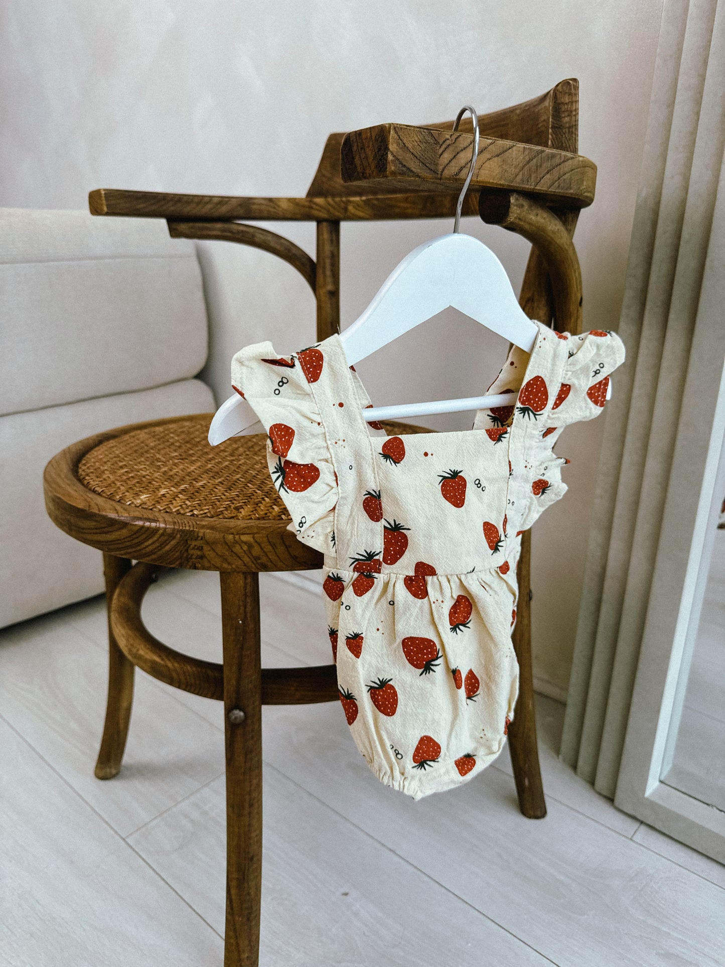 In stock summer cream strawberry cross back romper