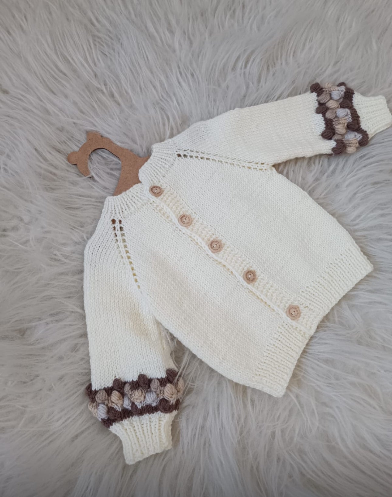 In stock hand-knitted brown bobble