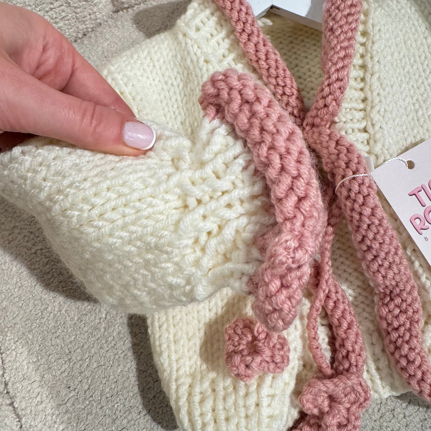 In stock pink and white handknit cardigan