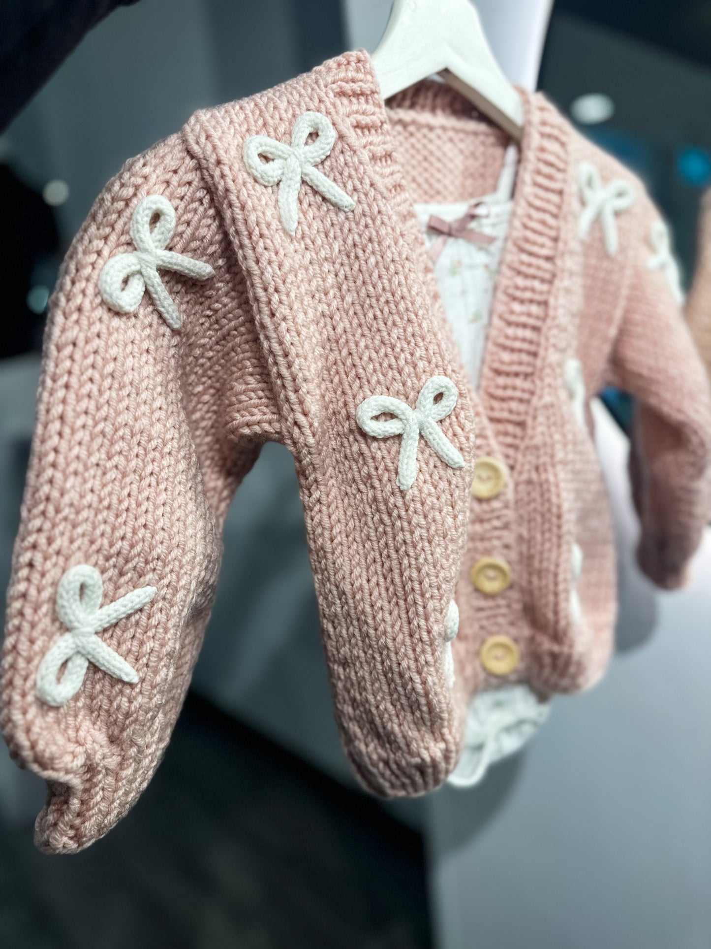 Handknitted rope bow cardigan