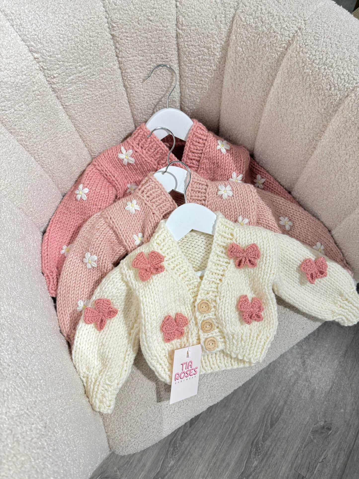 Hand knitted chunky cardigan cream bow