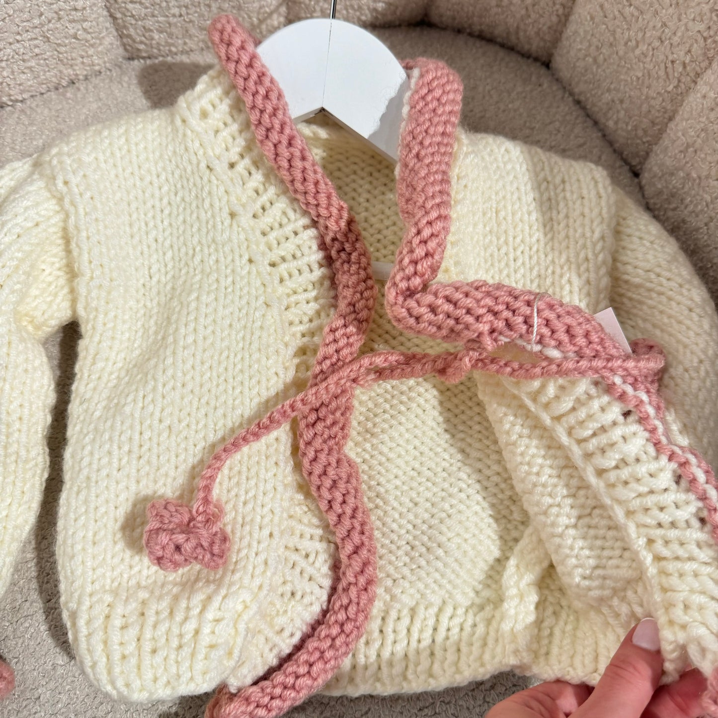 In stock pink and white handknit cardigan
