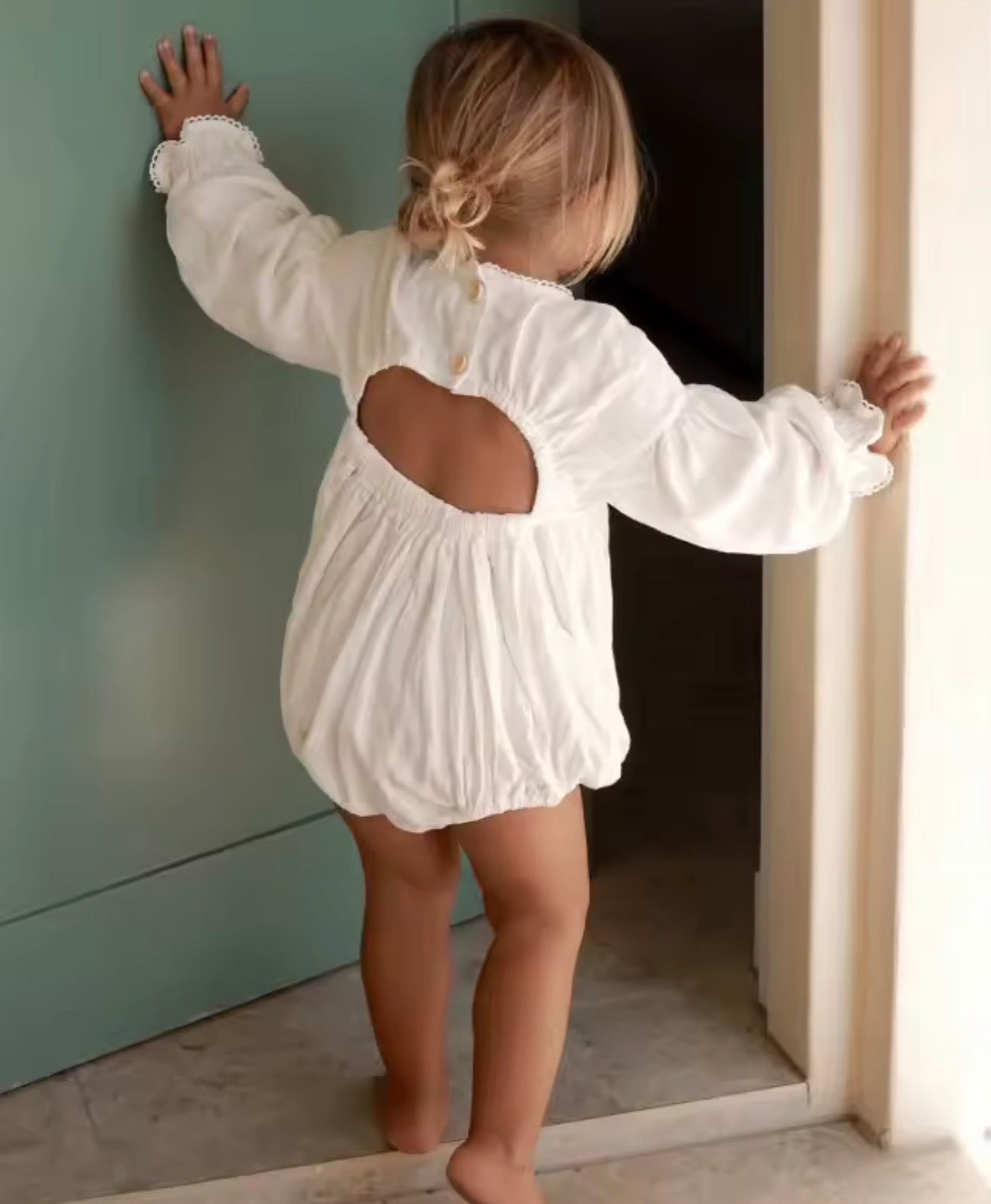 White open back long sleeve romper