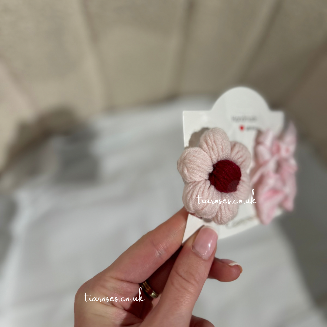 In stock handknitted pink flower clip set