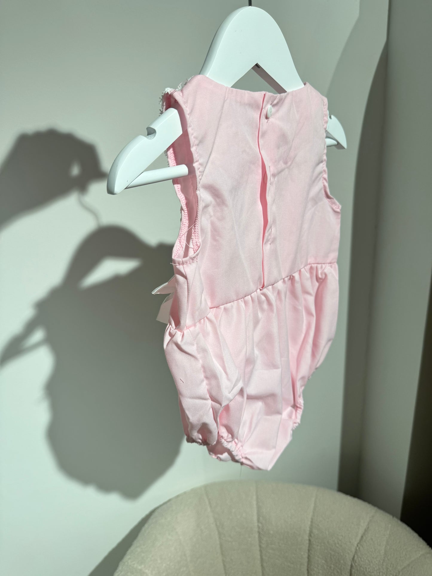 In stock pink silk bow romper