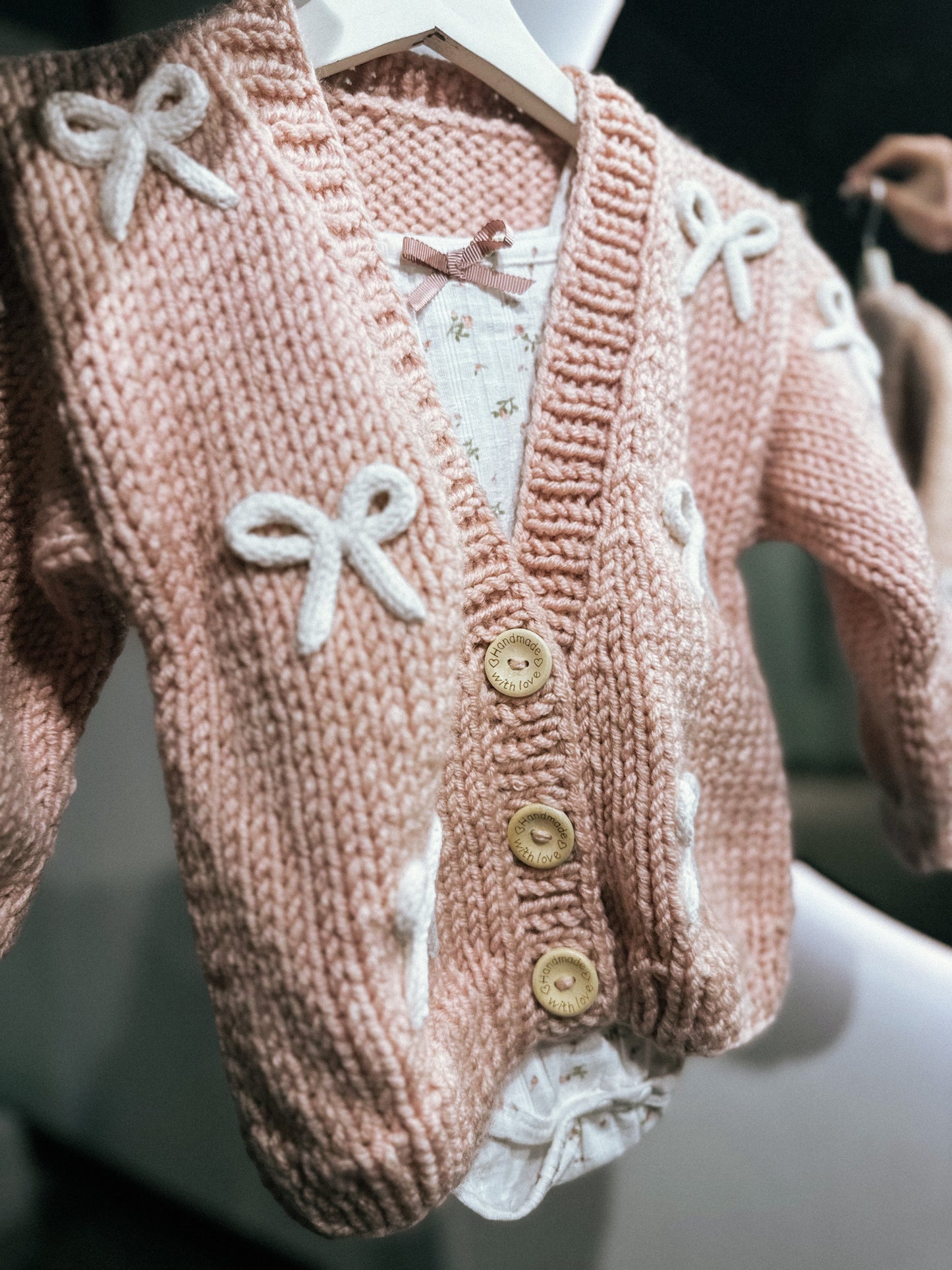 Handknitted rope bow cardigan