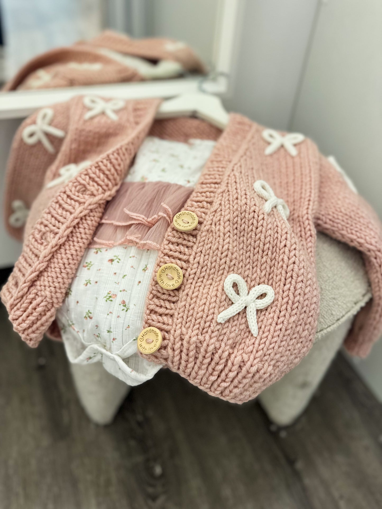Handknitted rope bow cardigan