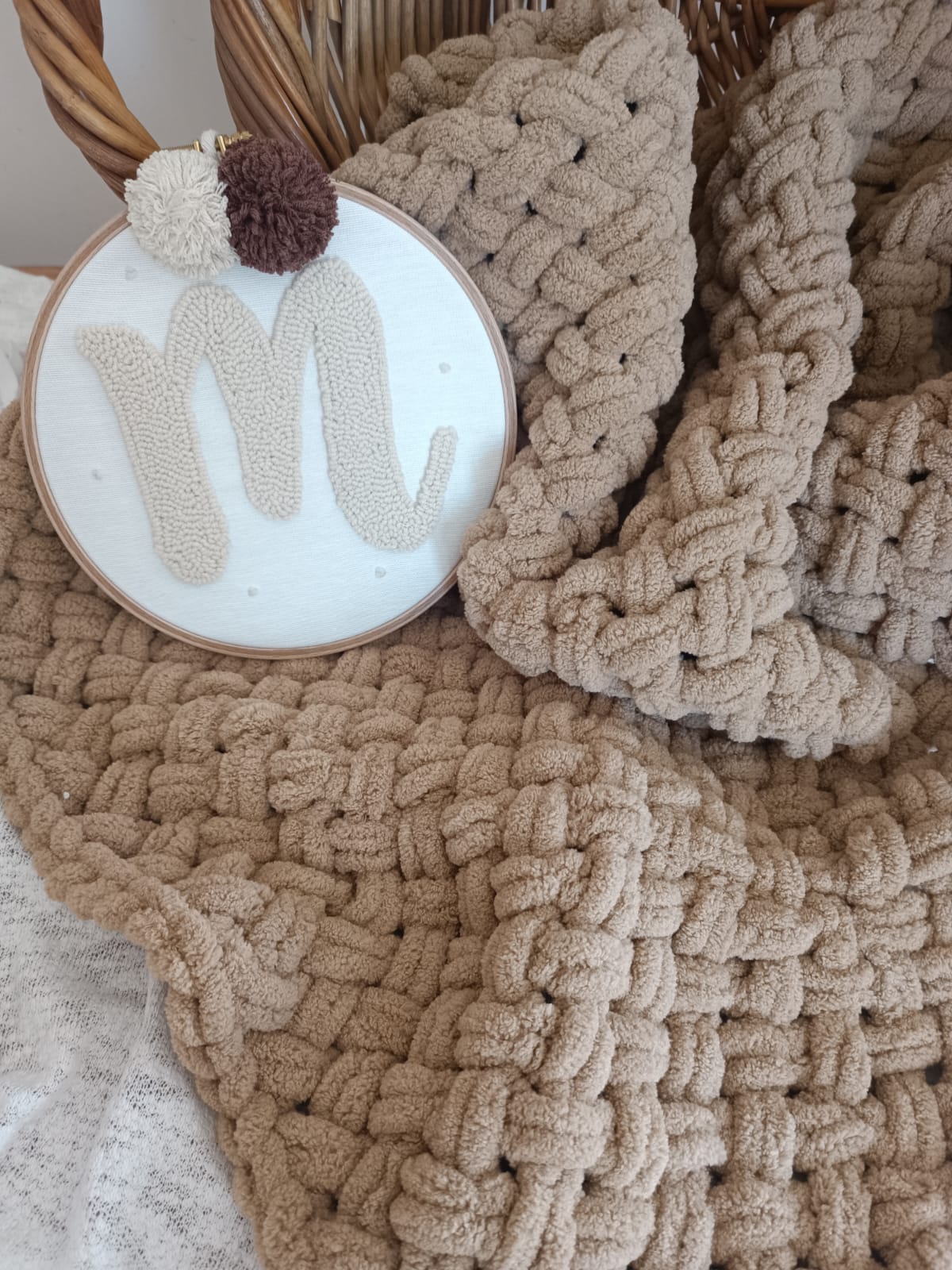 Chunky handknit Pom Pom blanket