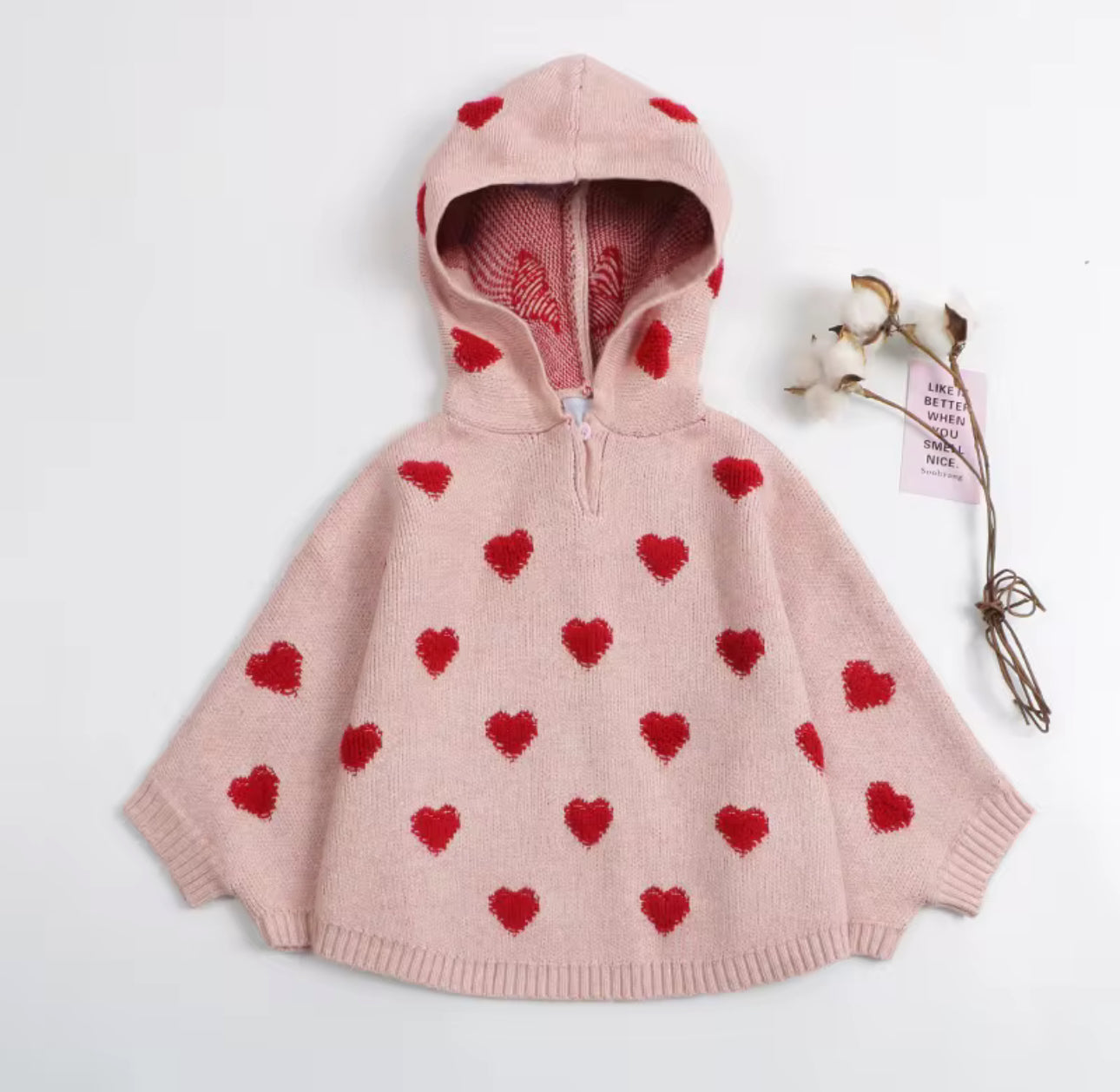 Thick knitted heart cape