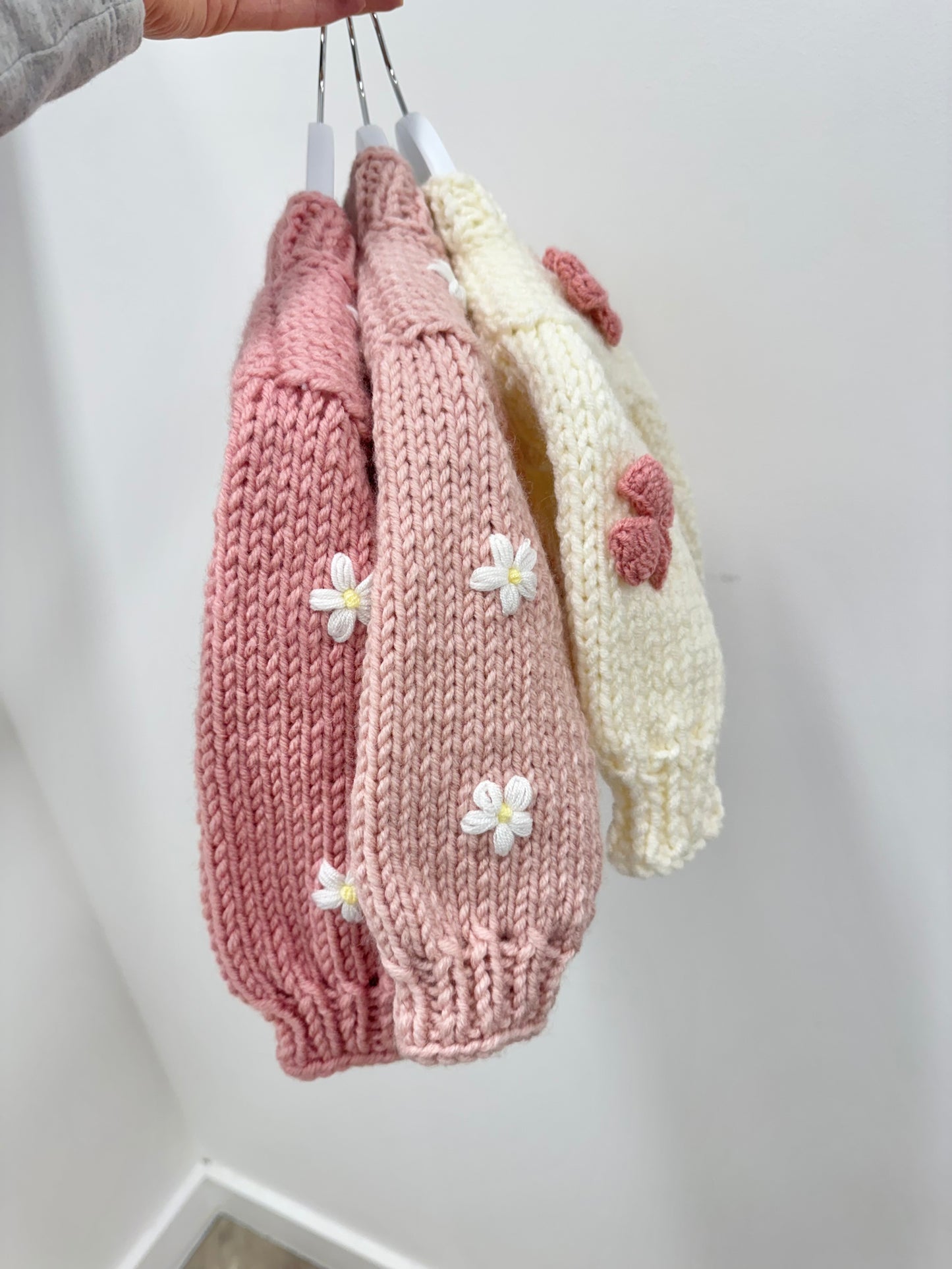 Hand knitted chunky cardigan cream bow