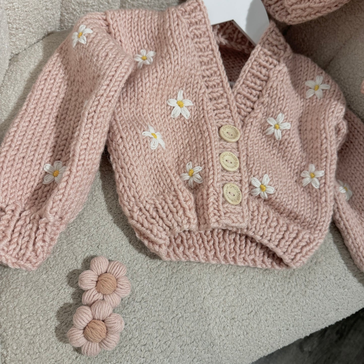 Handknitted flower hair clip in stock
