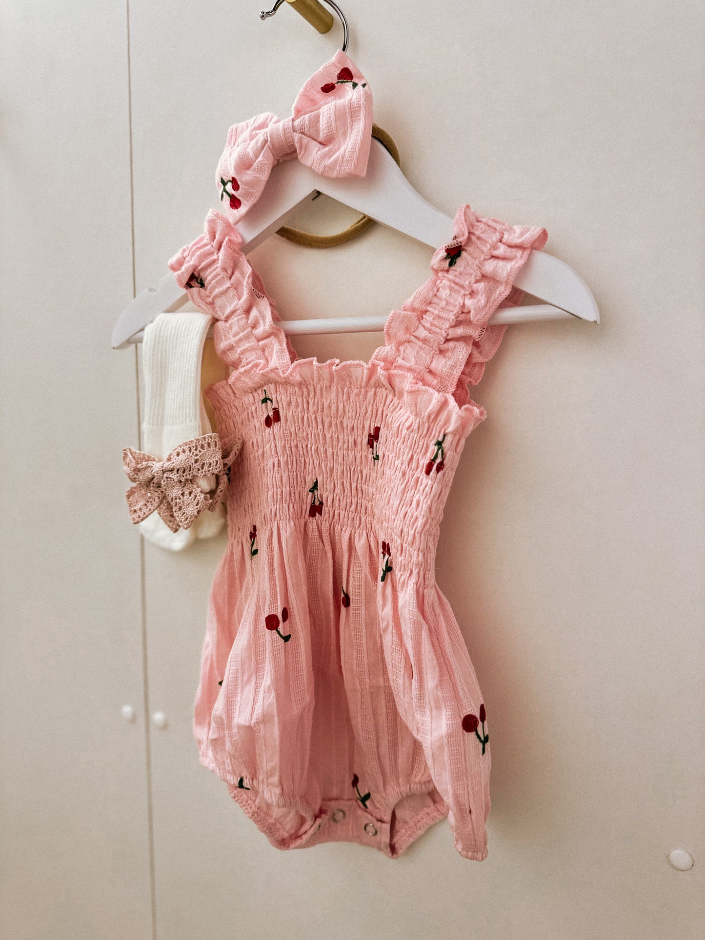 In stock spring/summer cherry pink ruffle romper and cherry print headband