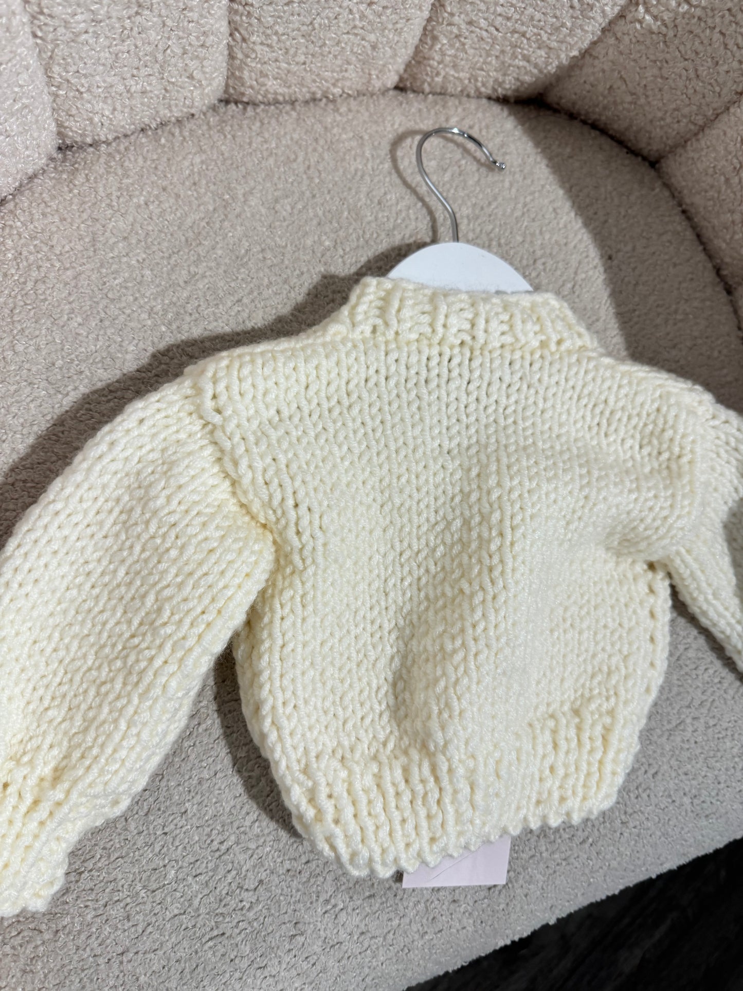 Hand knitted chunky cardigan cream bow