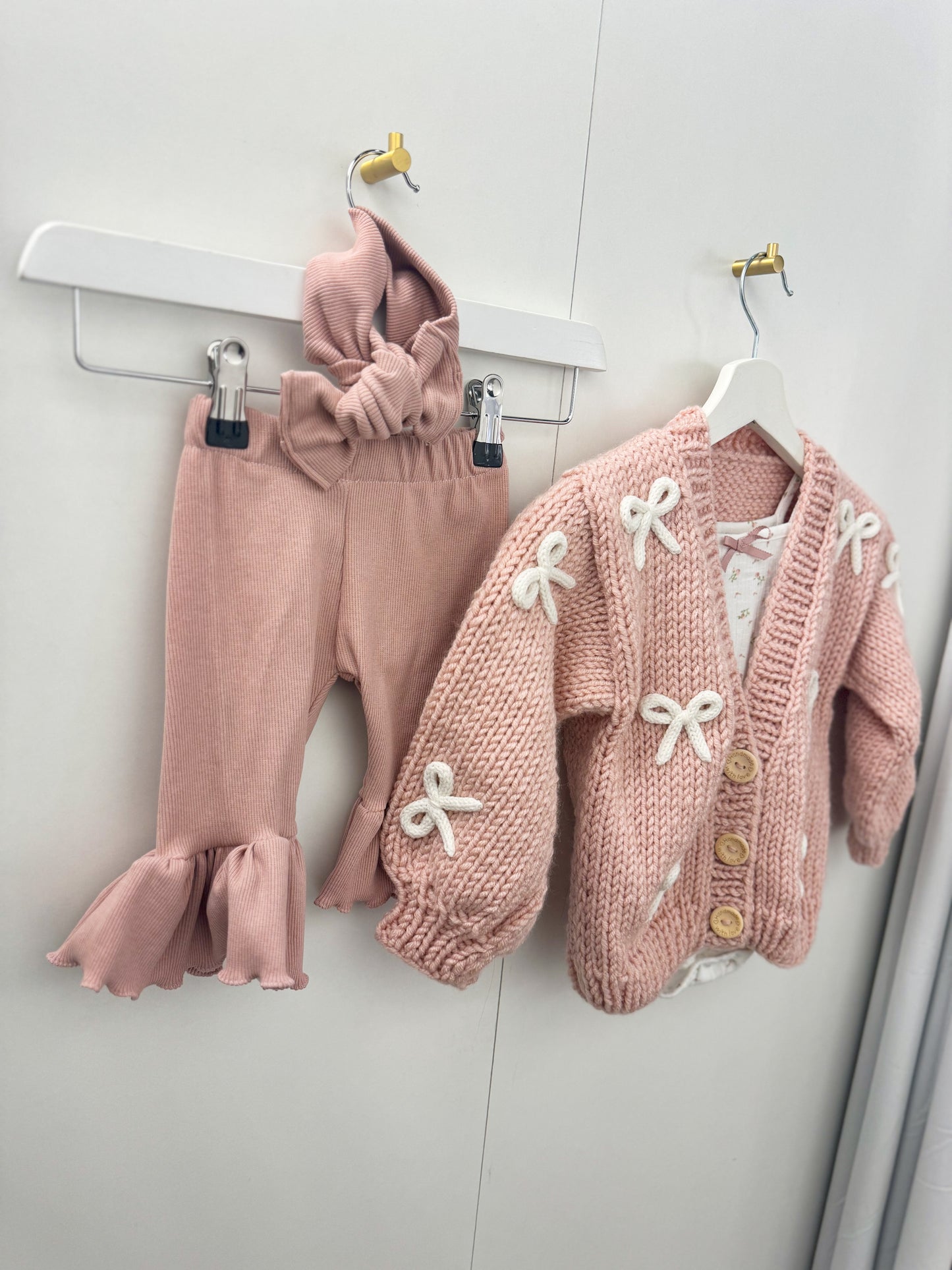 Handknitted rope bow cardigan