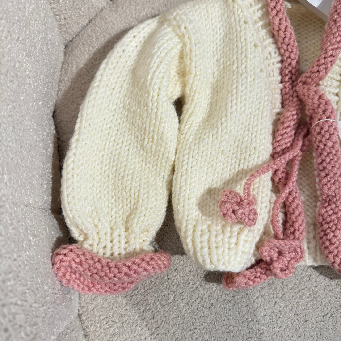 In stock pink and white handknit cardigan