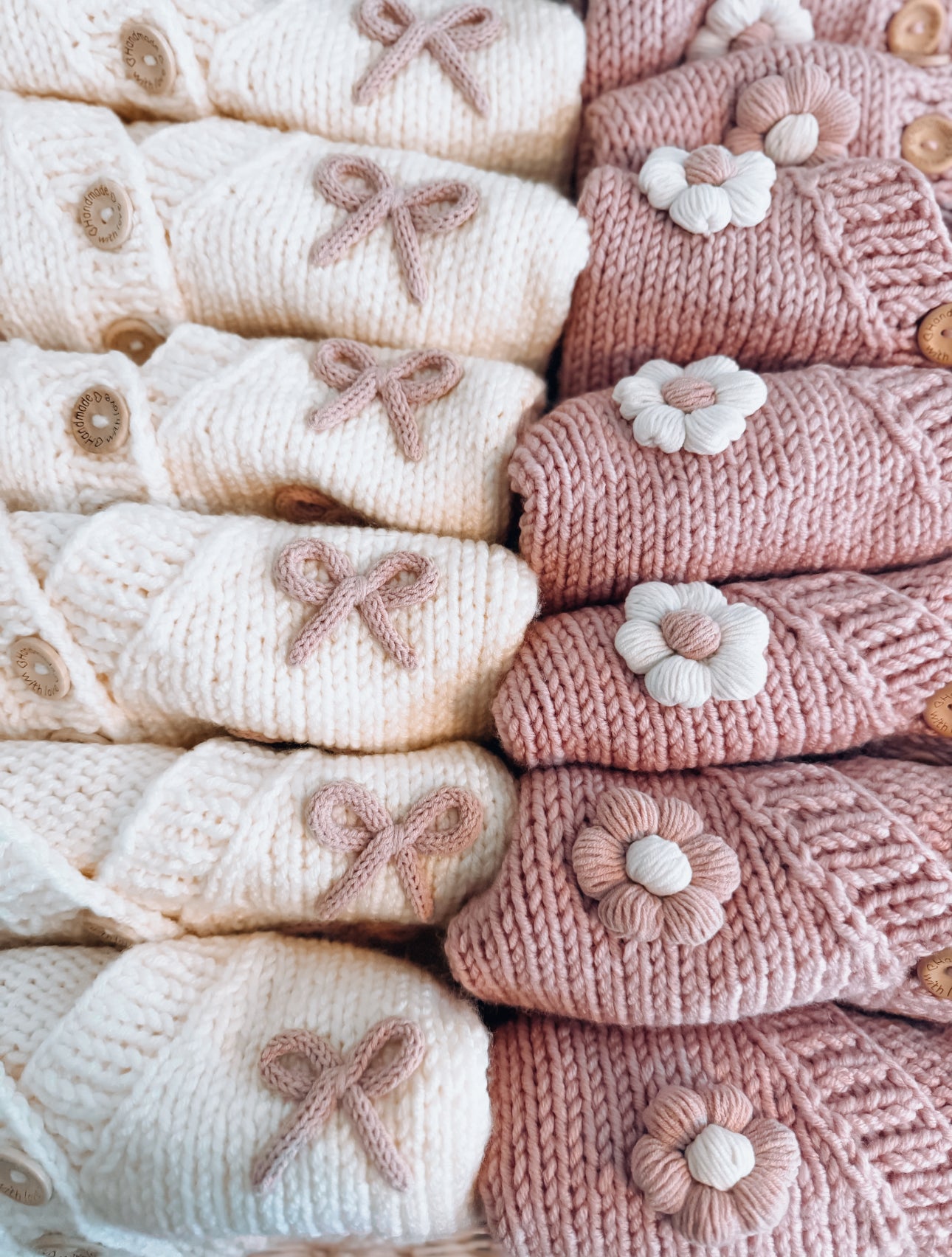 Cream and dusky pink bow hand knitted cardigan