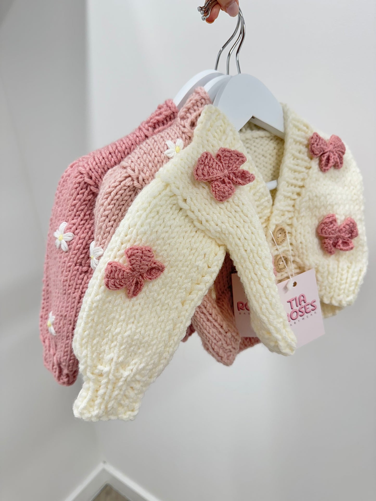 Hand knitted chunky cardigan cream bow