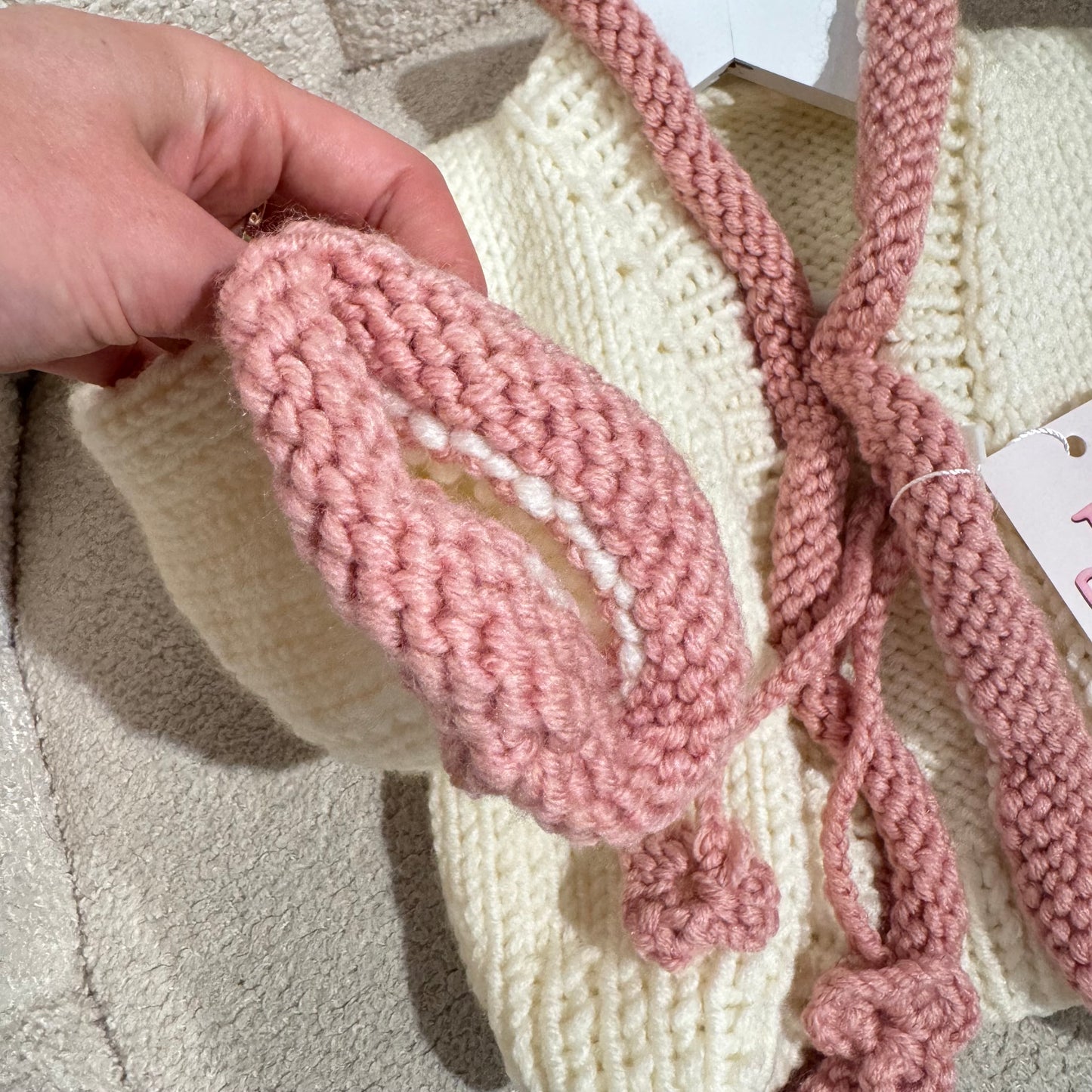 In stock pink and white handknit cardigan