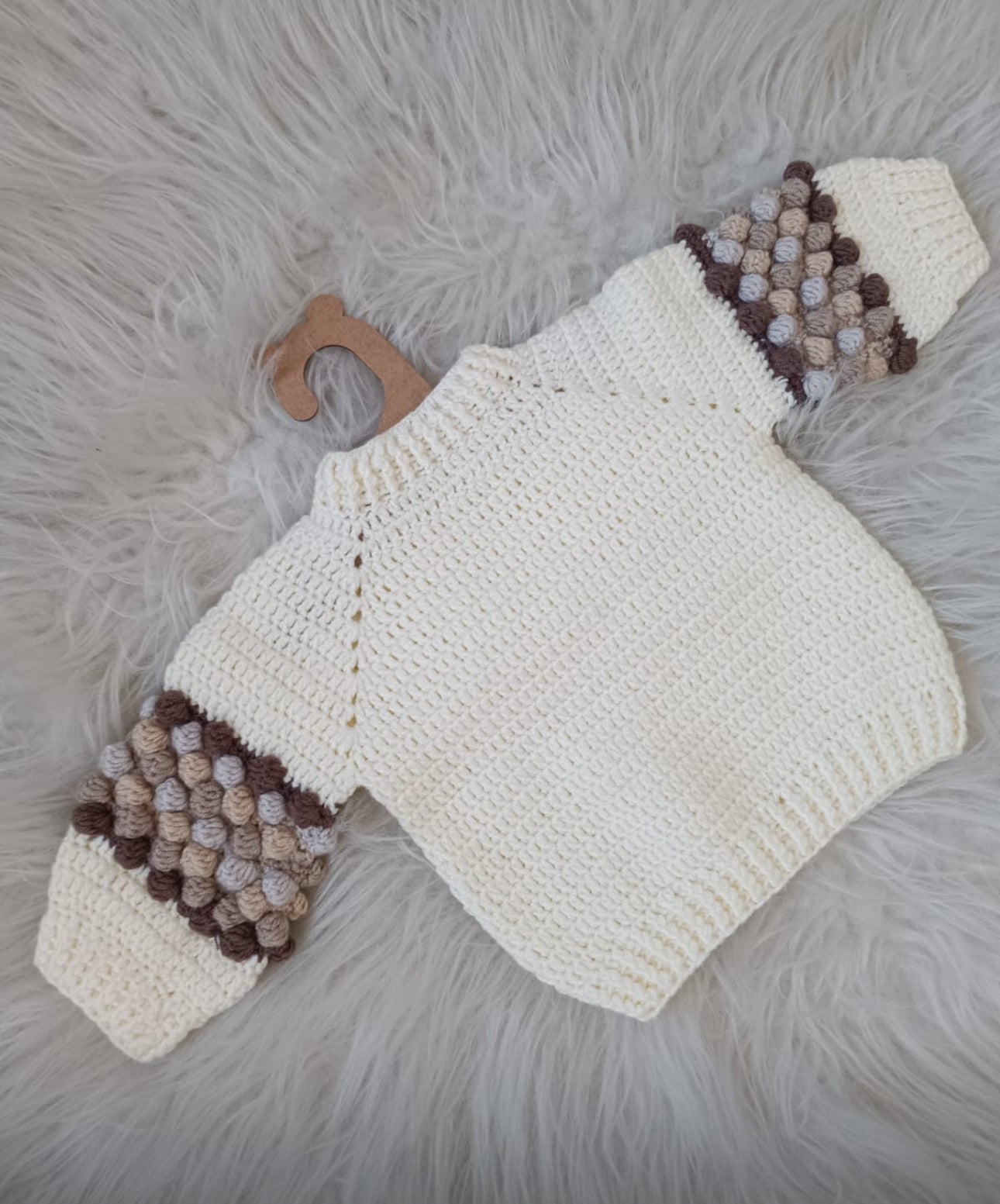 In stock hand-knitted brown bobble