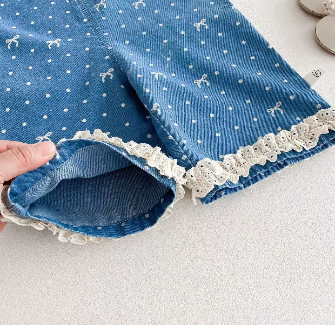 Denim spring bow dungarees with lace trim