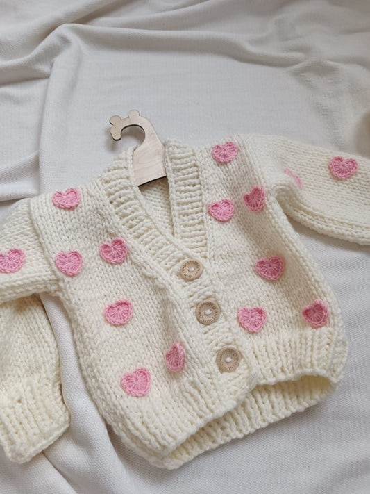 In stock cream and pink heart handknitted cardigan