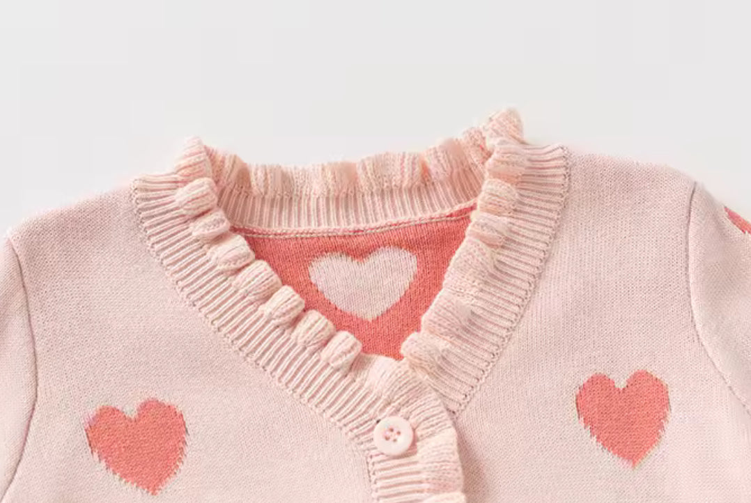 Thick knitted pink heart frill romper
