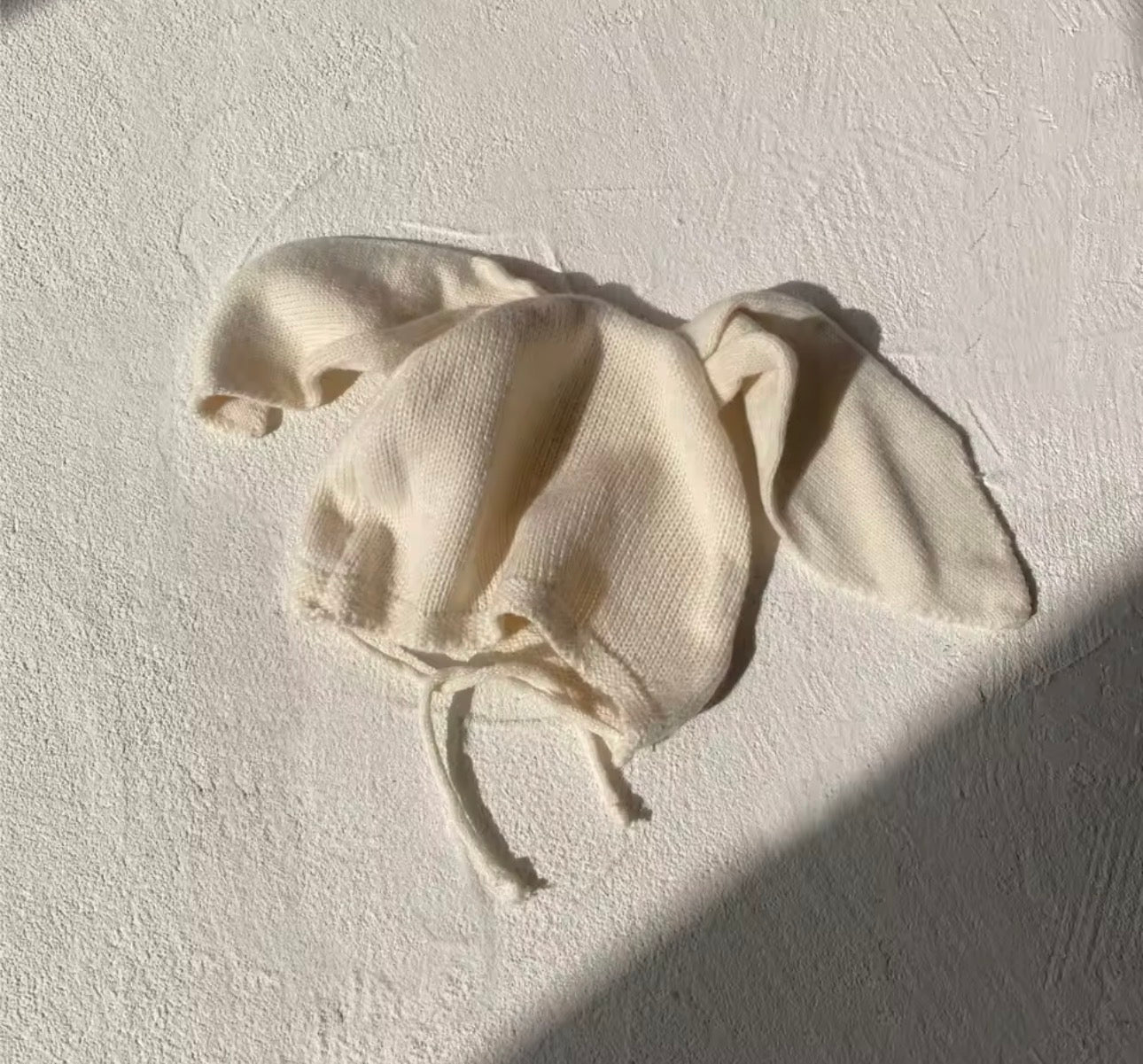 Soft cream knit romper and bunny hat