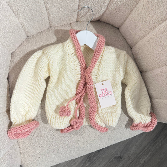 In stock pink and white handknit cardigan