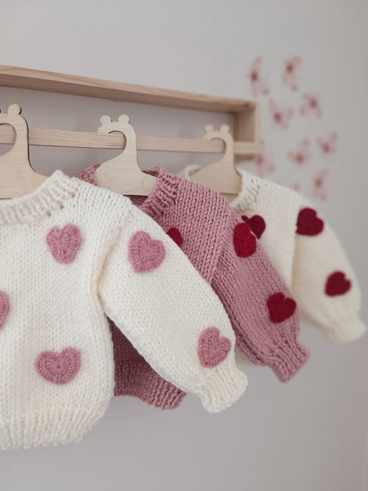 Handknitted heart in stock spring jumper