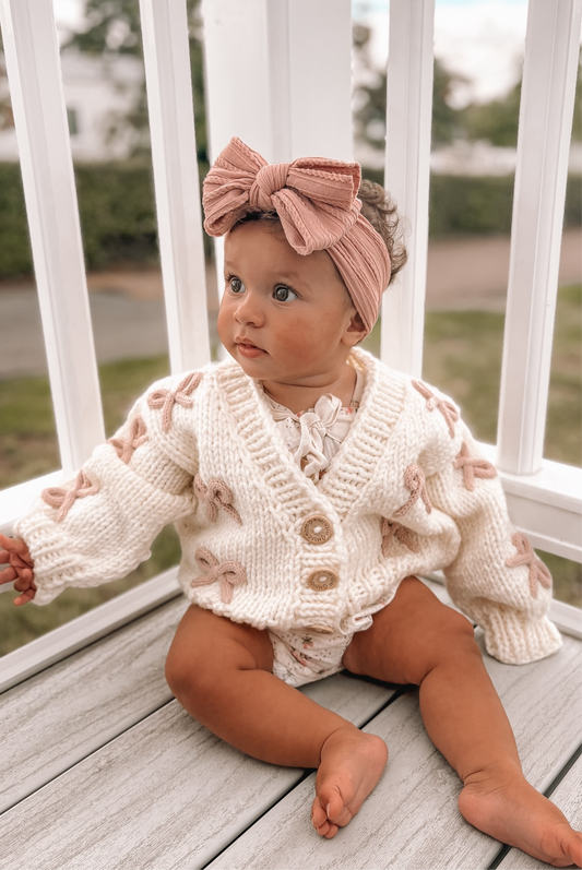 Cream and dusky pink bow hand knitted cardigan