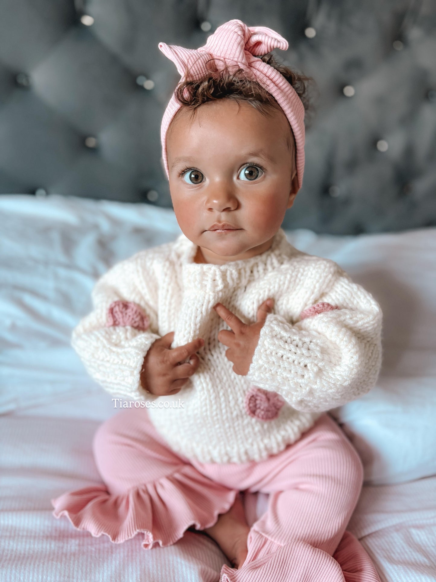 Handknitted heart in stock spring jumper