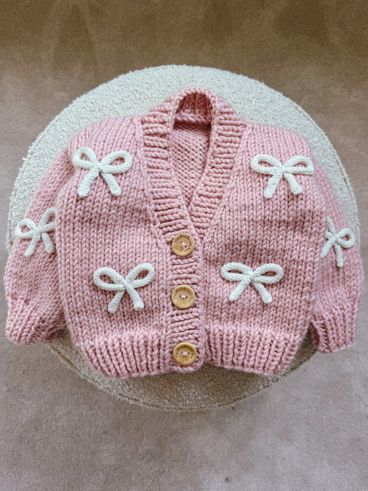 Handknitted rope bow cardigan
