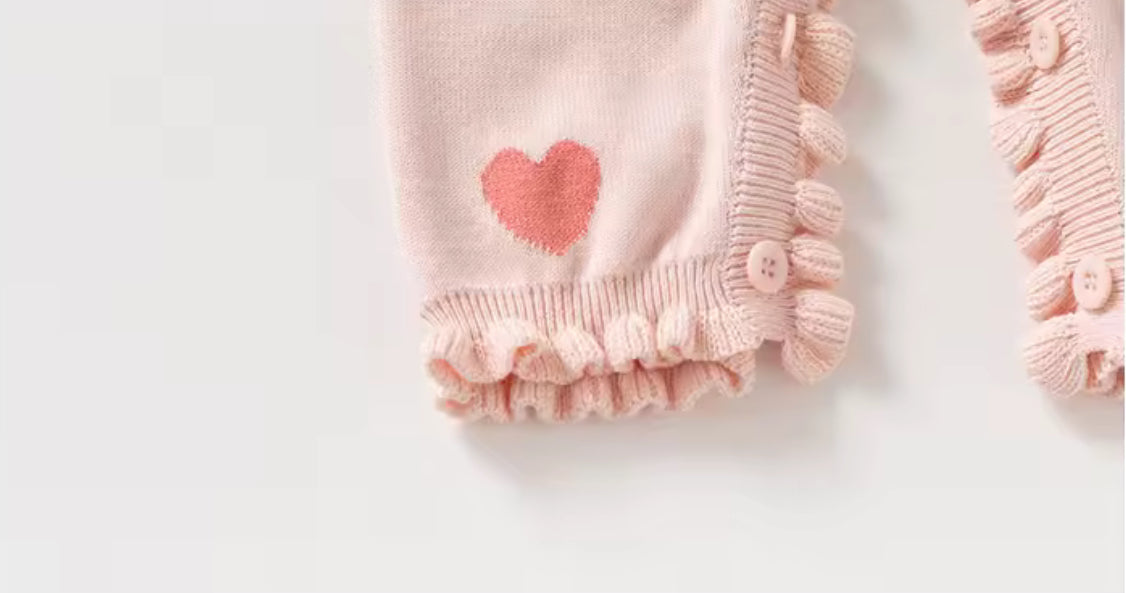 Thick knitted pink heart frill romper