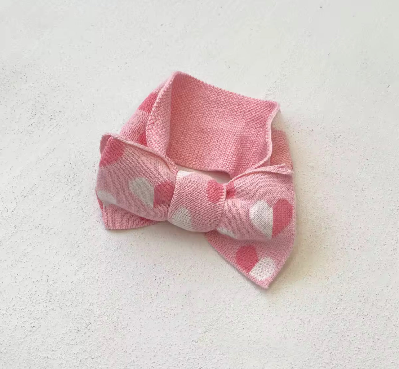 Thick knitted pink heart romper and giant tie headband