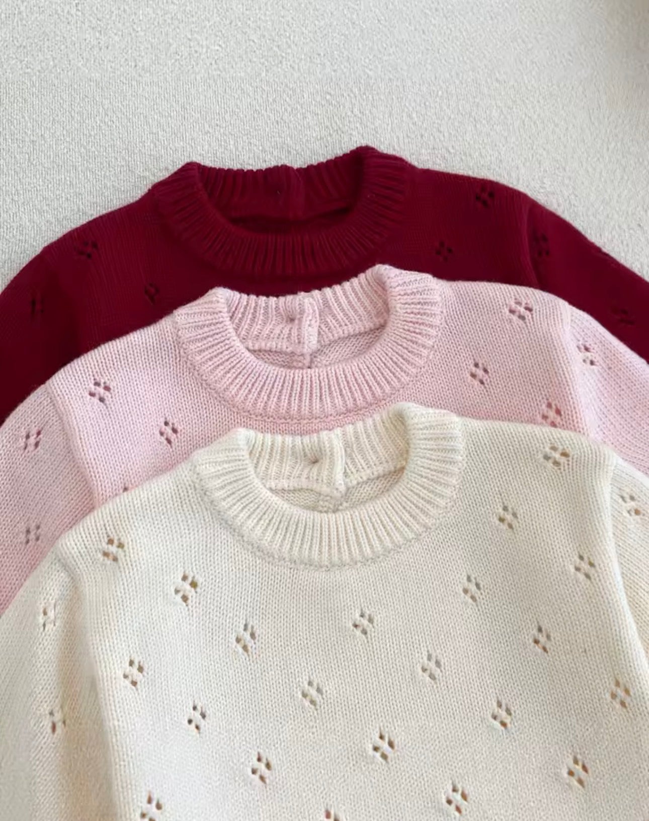 Soft knit pointelle rompers