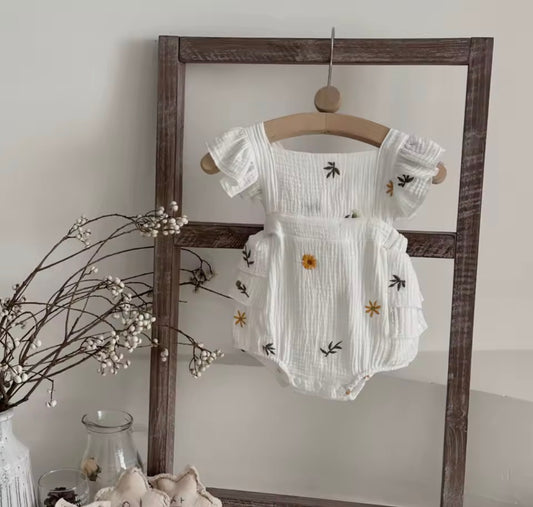 Embroidered flower white ruffle cross back romper