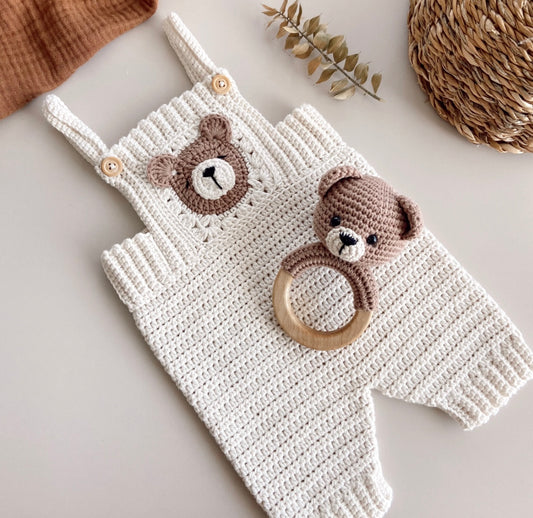 Handknitted teddy bear romper/rattle