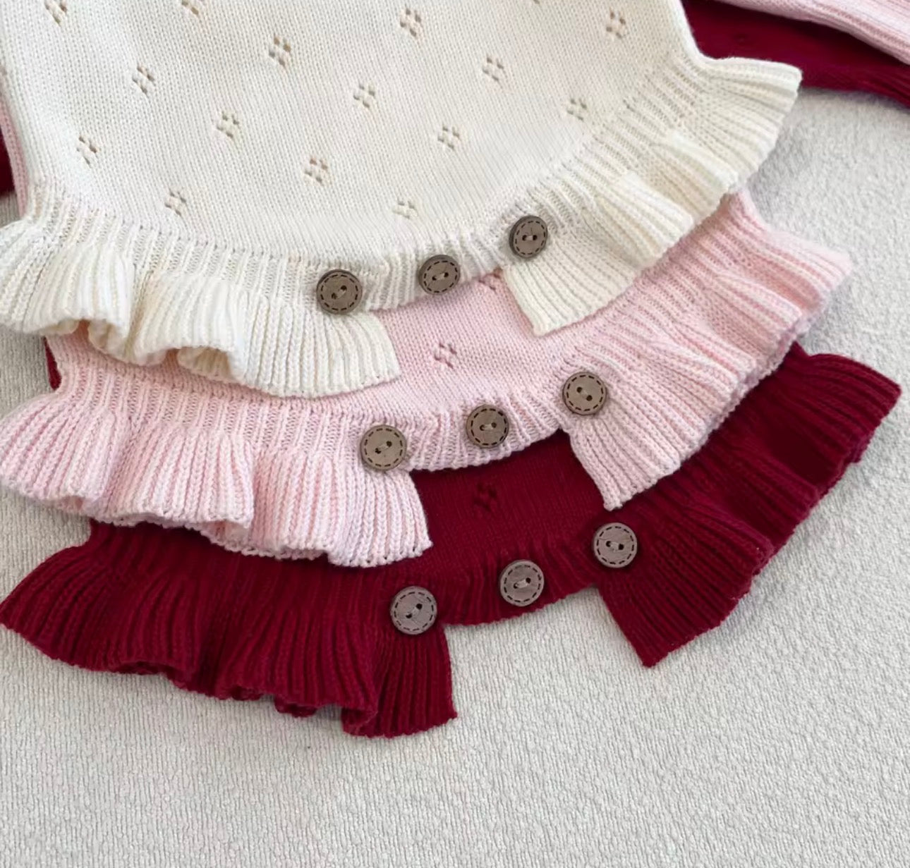 Soft knit pointelle rompers