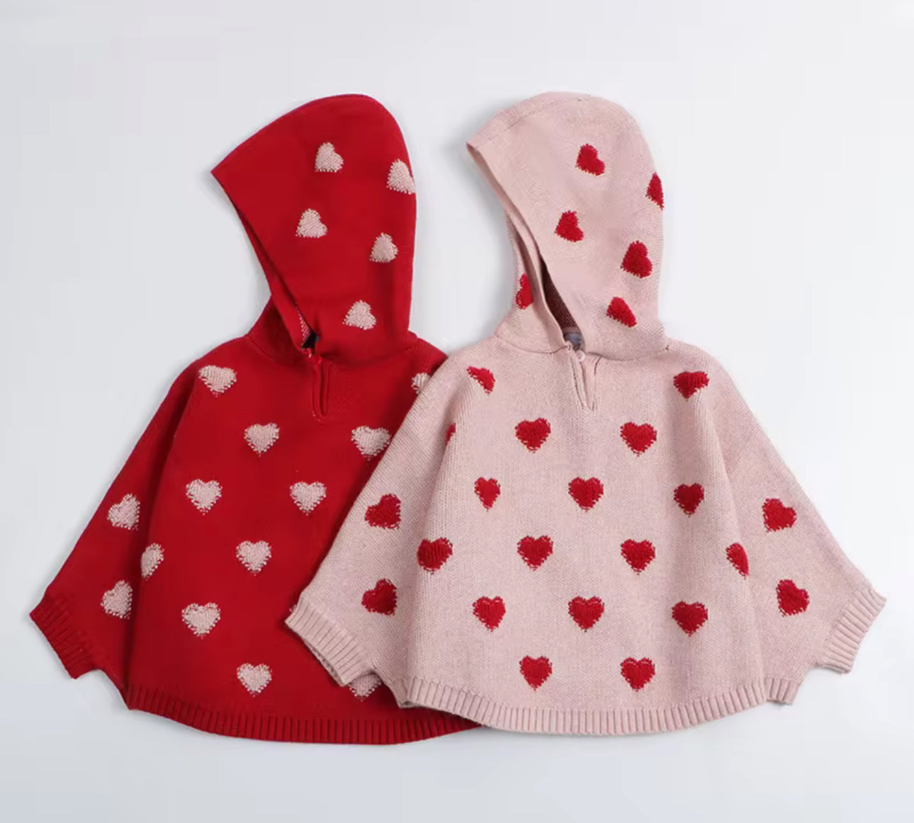 Thick knitted heart cape