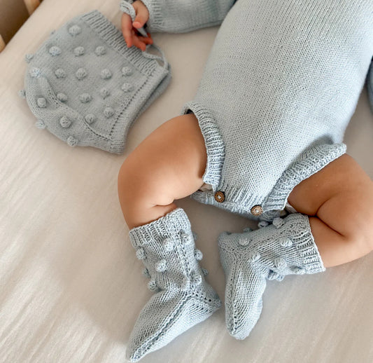 Baby blue handknitted collection romper/bonnet/booties