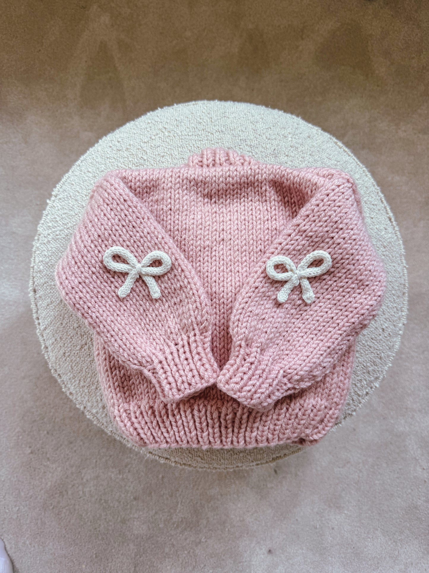 Handknitted rope bow cardigan