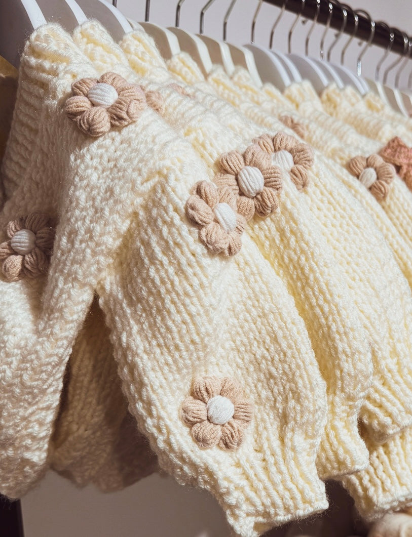Handknitted cream and light brown flower cardigans (flowers on front and back)