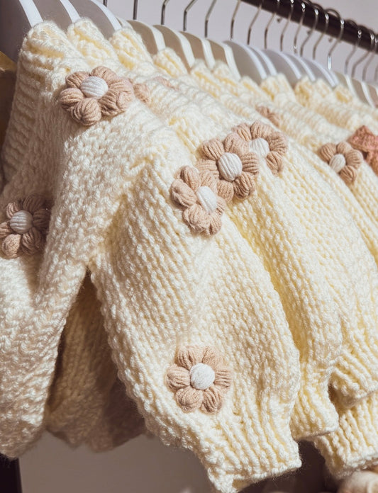 Handknitted cream and light brown flower cardigans (flowers on front and back)