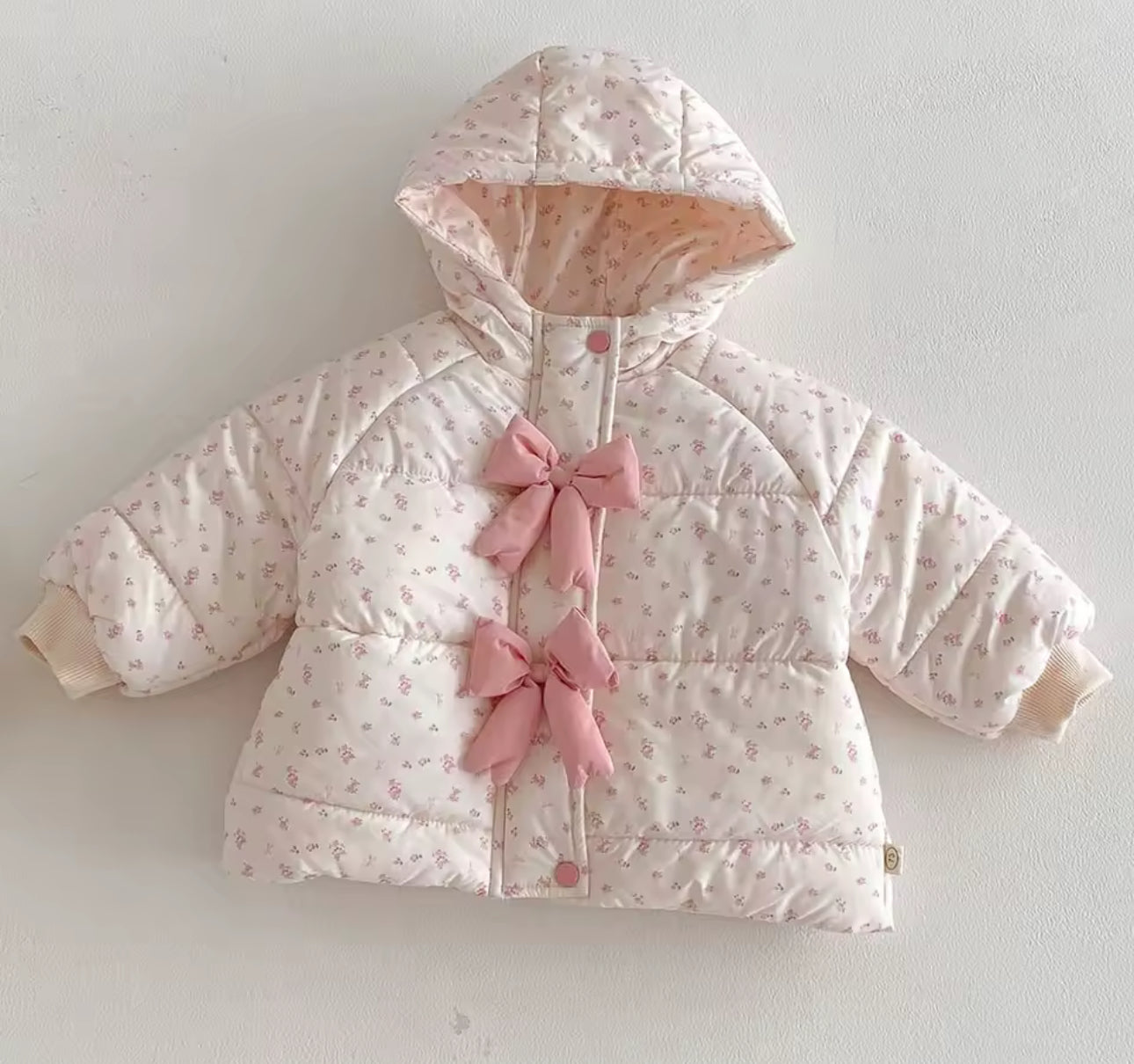 Floral bow puffer coats