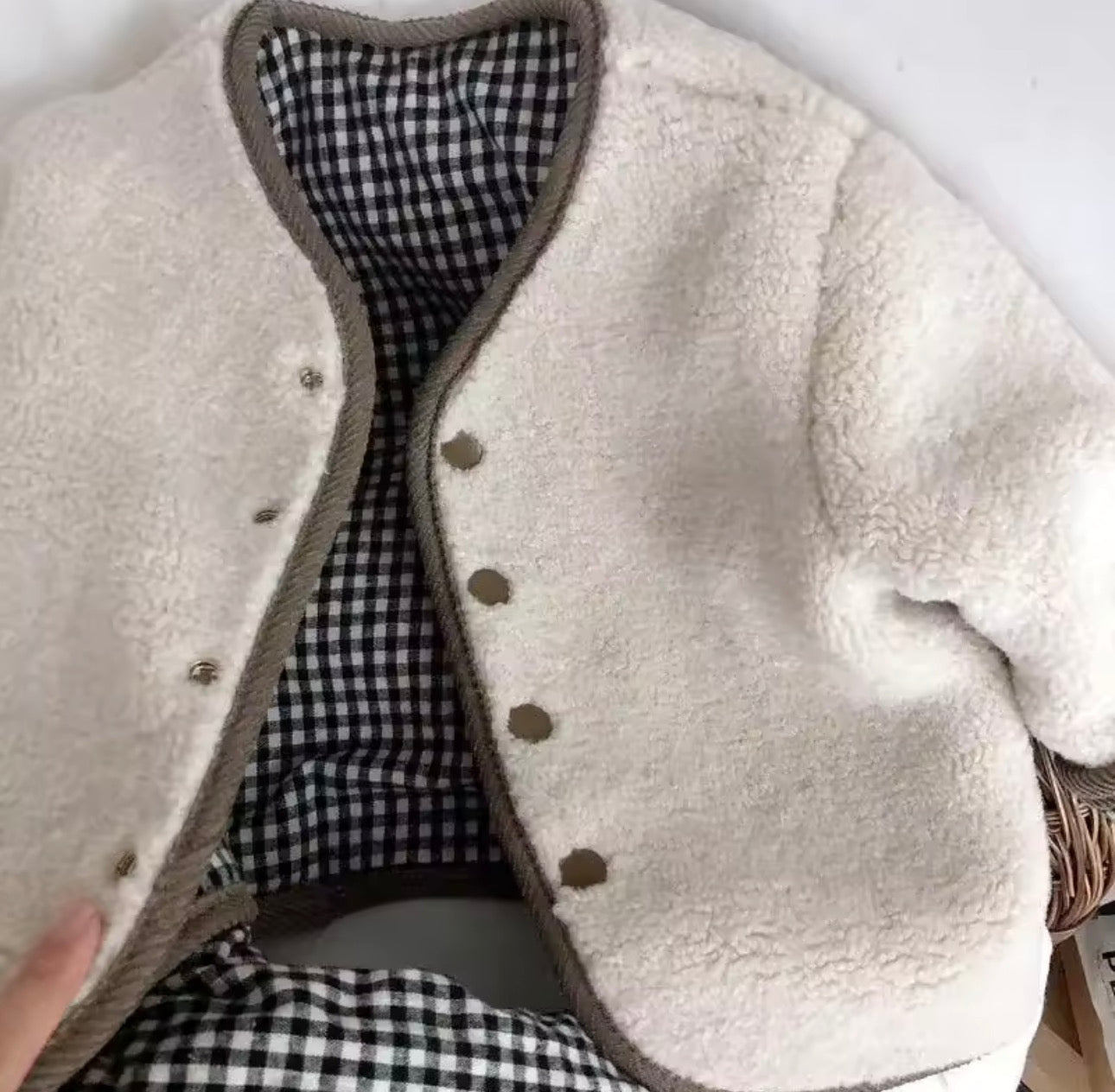 Reversible Sherpa/chequered jacket