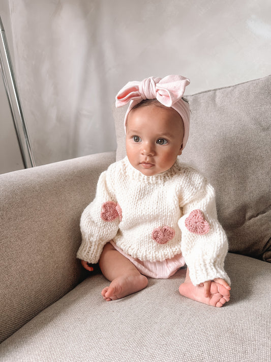 Handknitted heart in stock spring jumper